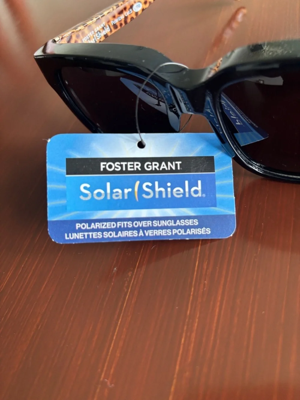 Foster Grant Solar Shield polarized,tortoise shell leopard arms,black frame/lens